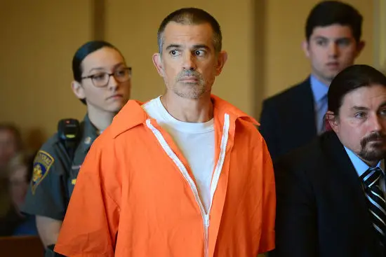 Fotis Dulos, accused of killing his wife Jennifer Farber Dulos, appears in a prison jumpsuit during a hearing in 2019 in Norwalk Superior Court.